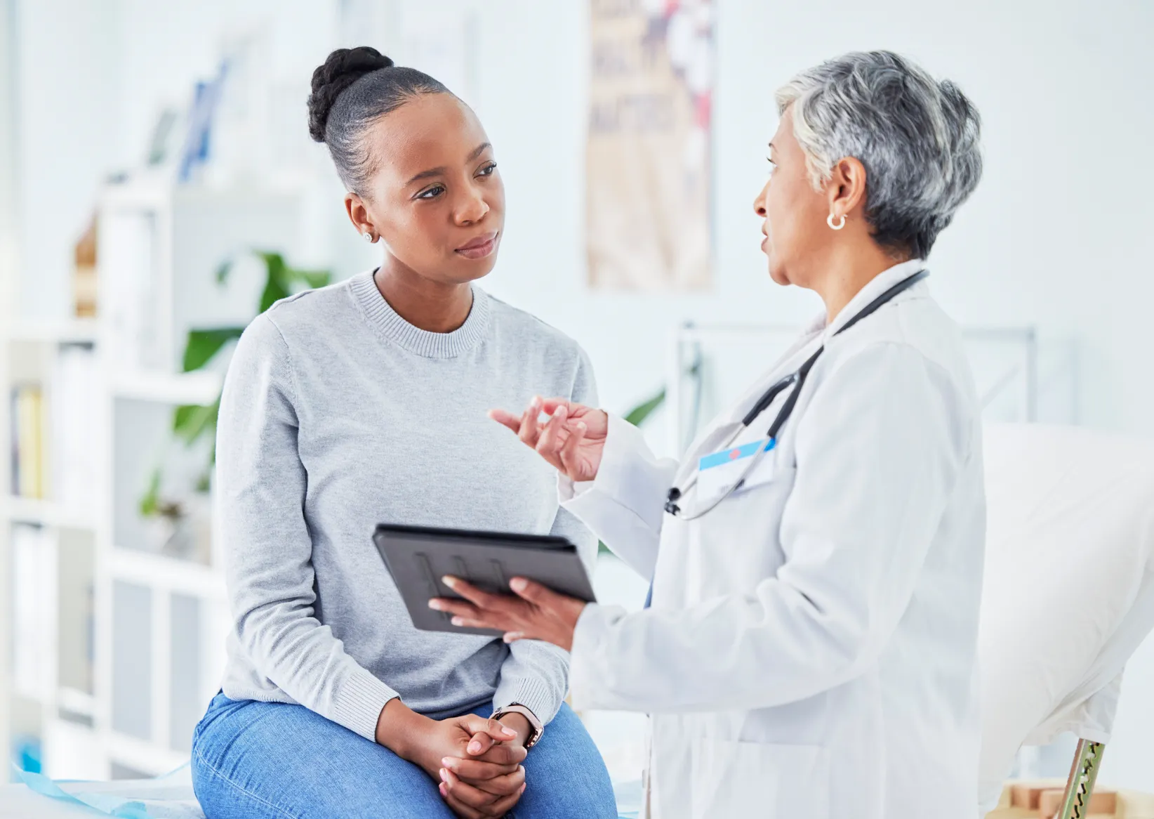 A doctor speaking with her patient.