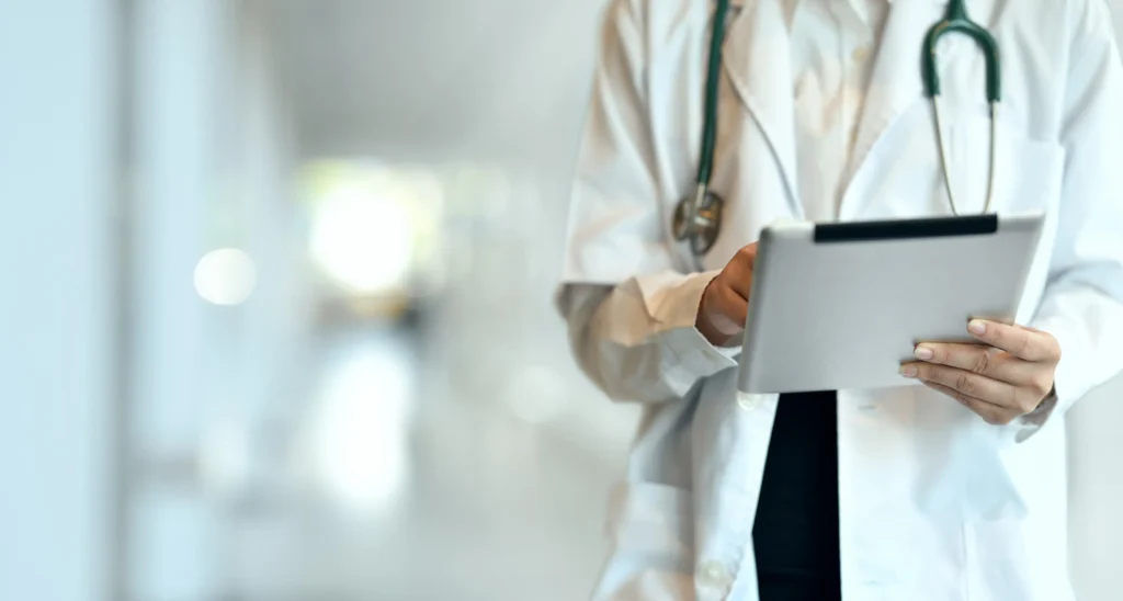 Doctor reviewing patient charts.