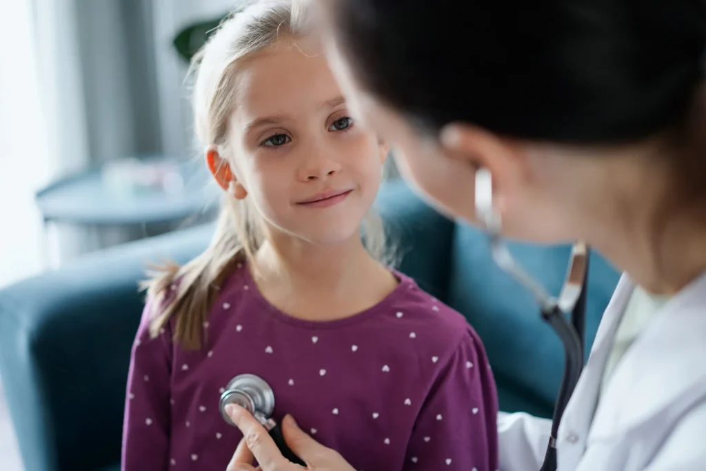 A pediatric doctor with a patient.
